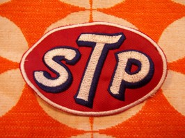 PATCH OVALE 'STP'
